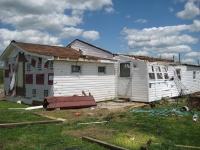 Damage to another home near the town of Mount Vernon. ~ 837 kb